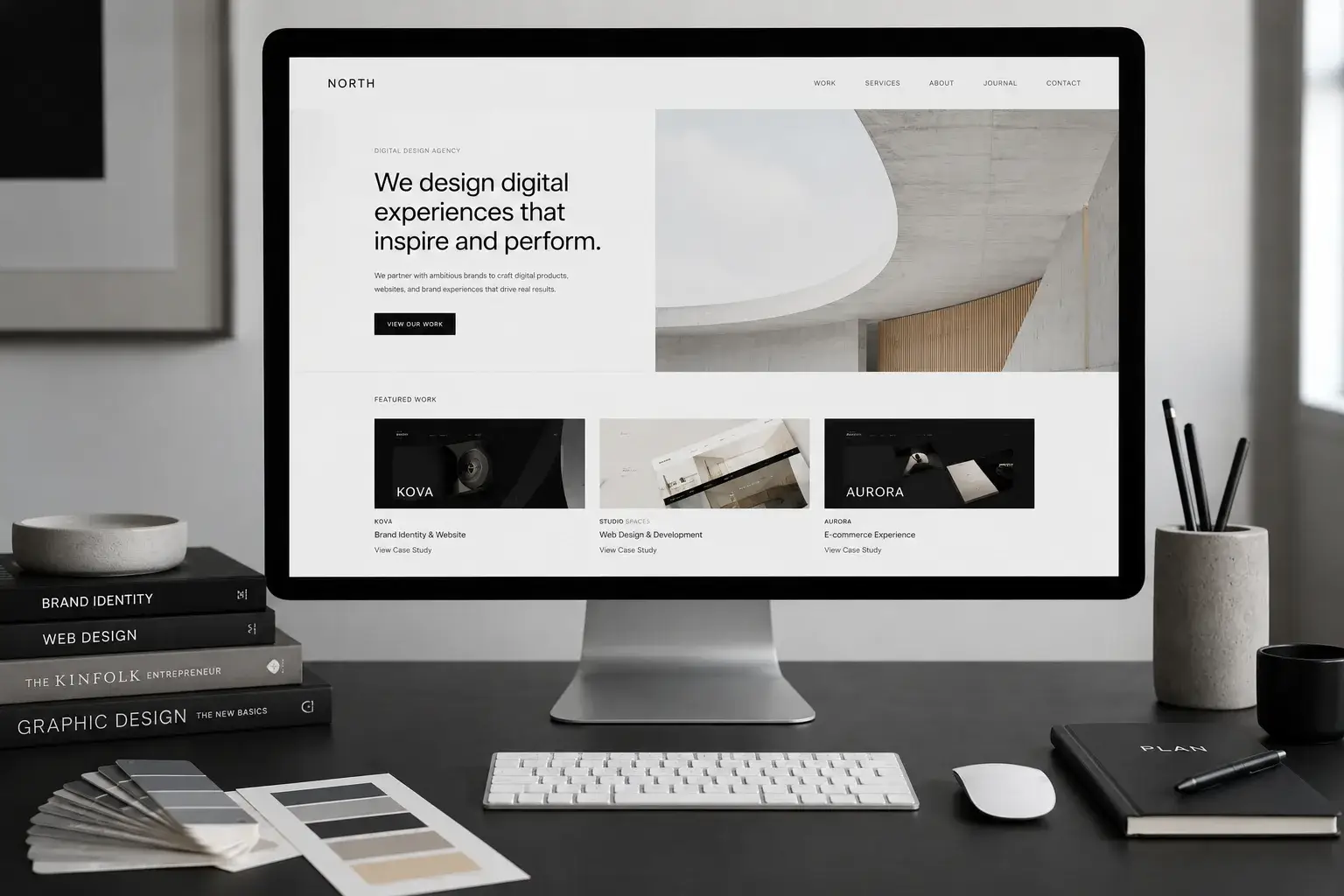 Desktop monitor showing a minimal website design